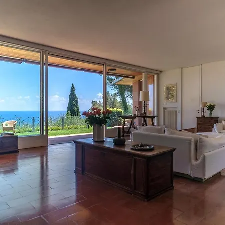 With A Swimming Pool Overlooking The Sea